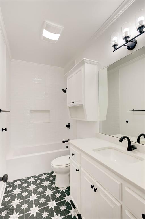 316 Autumn Ridge Drive Bossier City, LA 71111 - Photo 34 of 40 a bathroom with a sink toilet a mirror and vanity