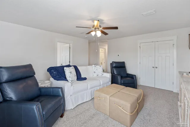 a bedroom with a bed and a table