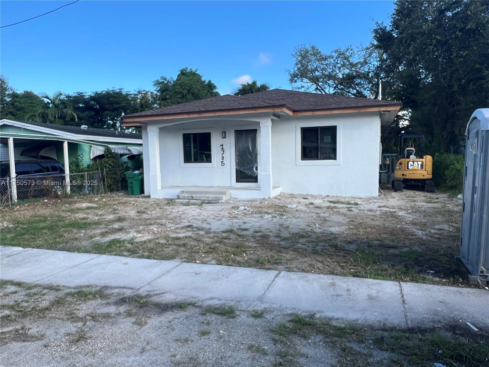1735 Northwest 84th Street Miami, FL 33147 - Photo 4 of 14 a view of a house with a outdoor space