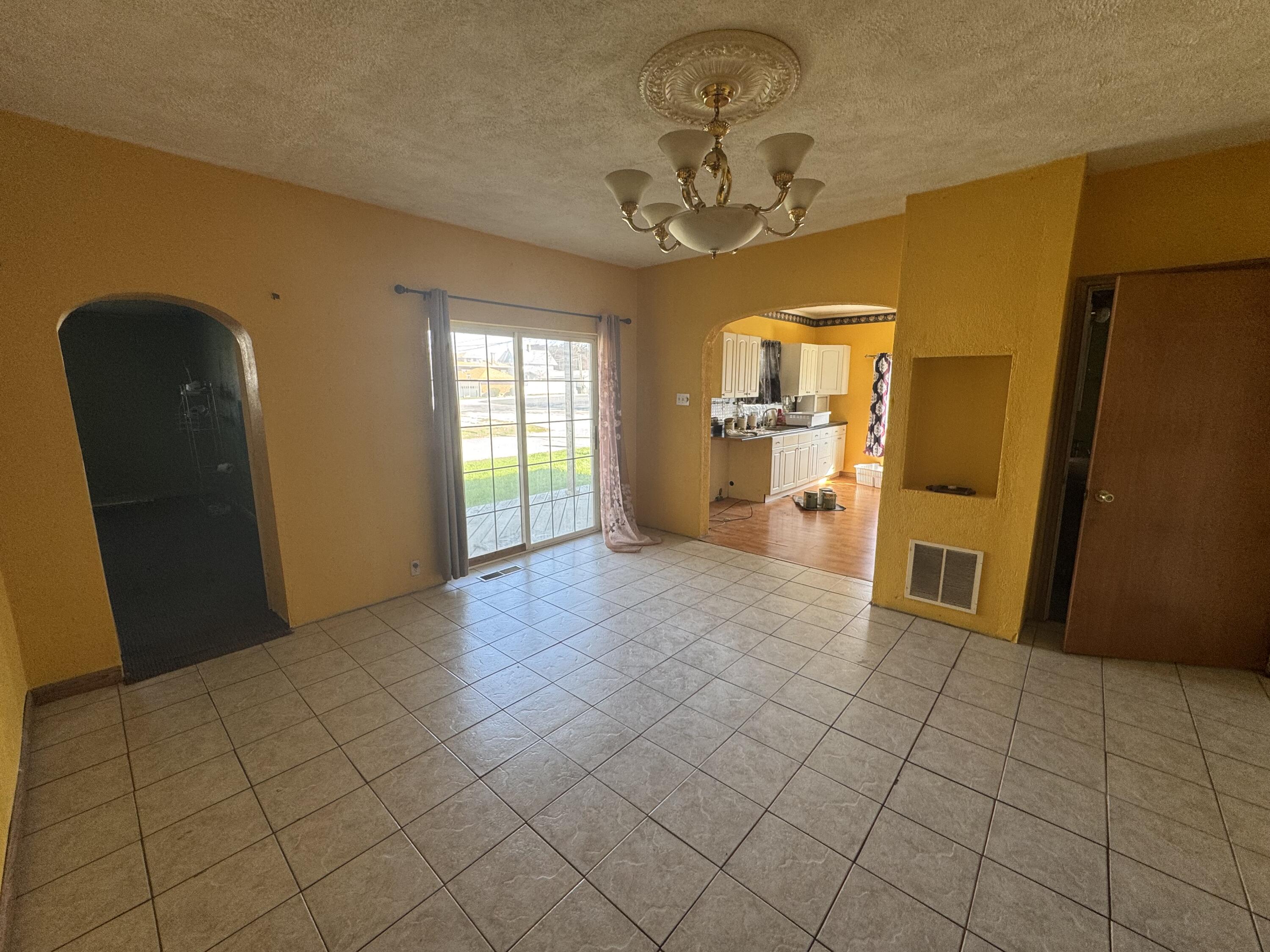 202 West Walnut Street Akron, IN 46910 - Photo 6 of 10 a view of a big room with windows