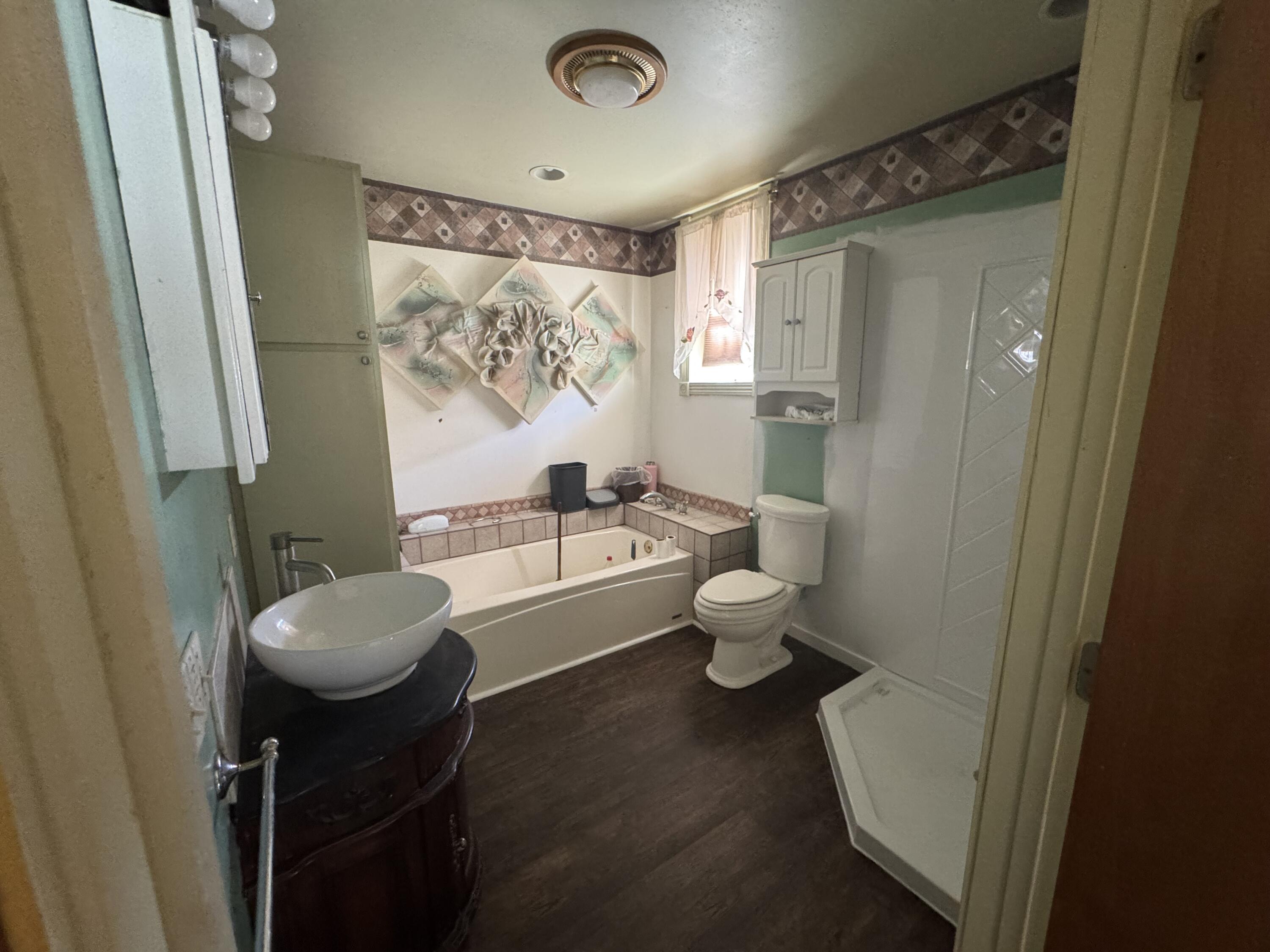 202 West Walnut Street Akron, IN 46910 - Photo 10 of 10 a bathroom with a toilet sink and bathtub