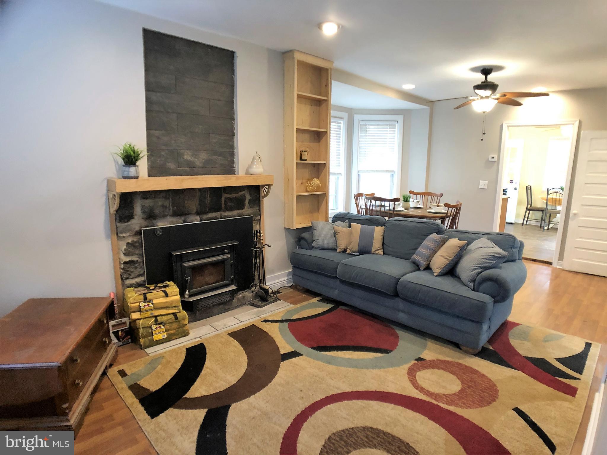 646 Convent Road Aston, PA 19014 - Photo 5 of 20 Living room with wood burning fireplace