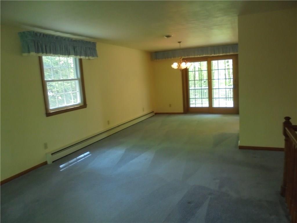 511 Alexander Road Latrobe, PA 15650 - Photo 14 of 20 Dining Room with door leading to covered porch.