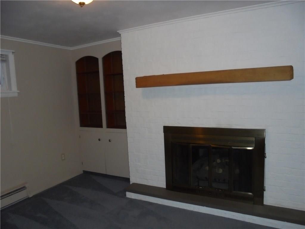 511 Alexander Road Latrobe, PA 15650 - Photo 16 of 20 Family room with gas fireplace and built ins.
