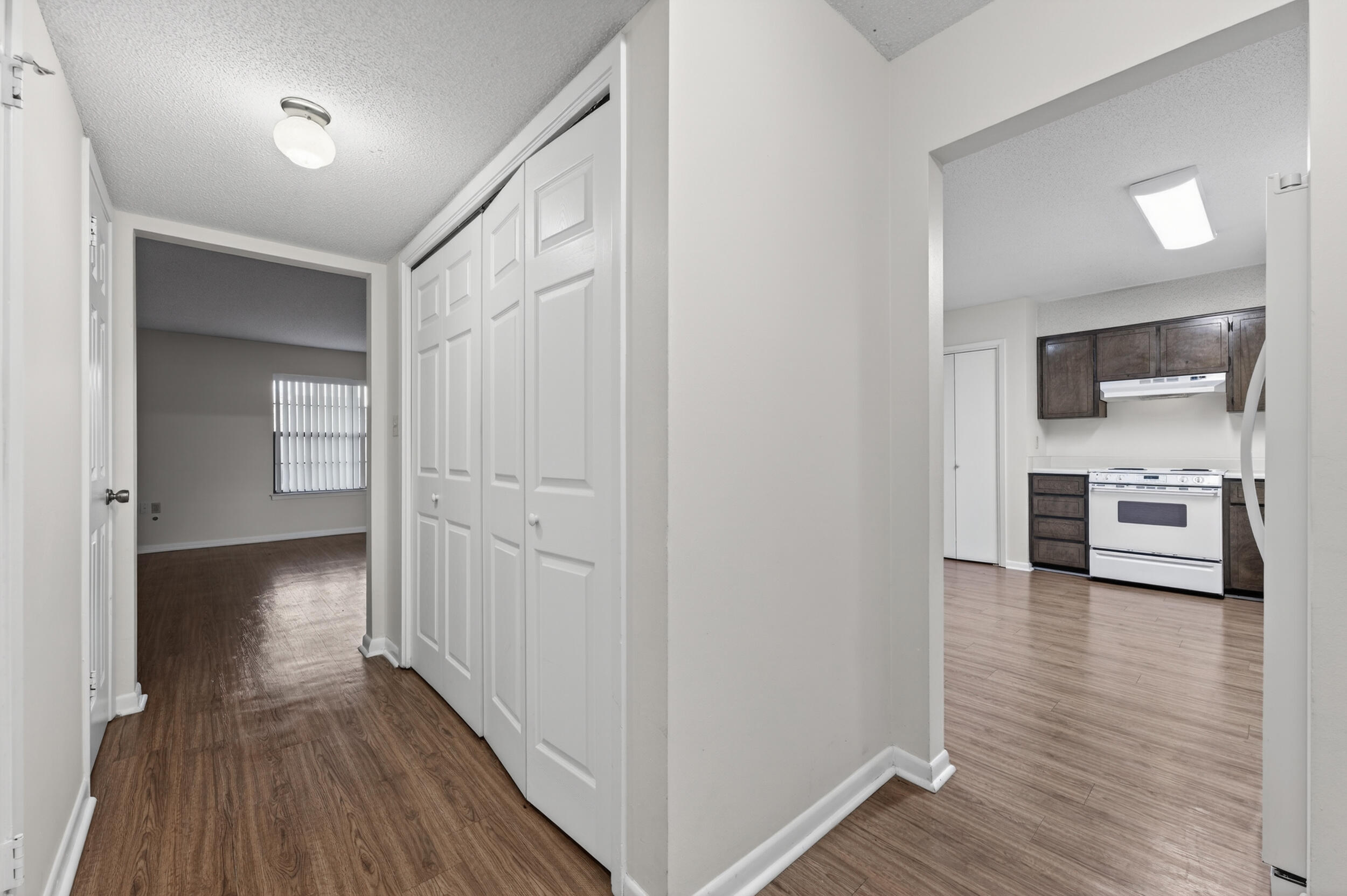132 5th Avenue Shalimar, FL 32579 - Photo 12 of 39 a view of a hallway with wooden floor