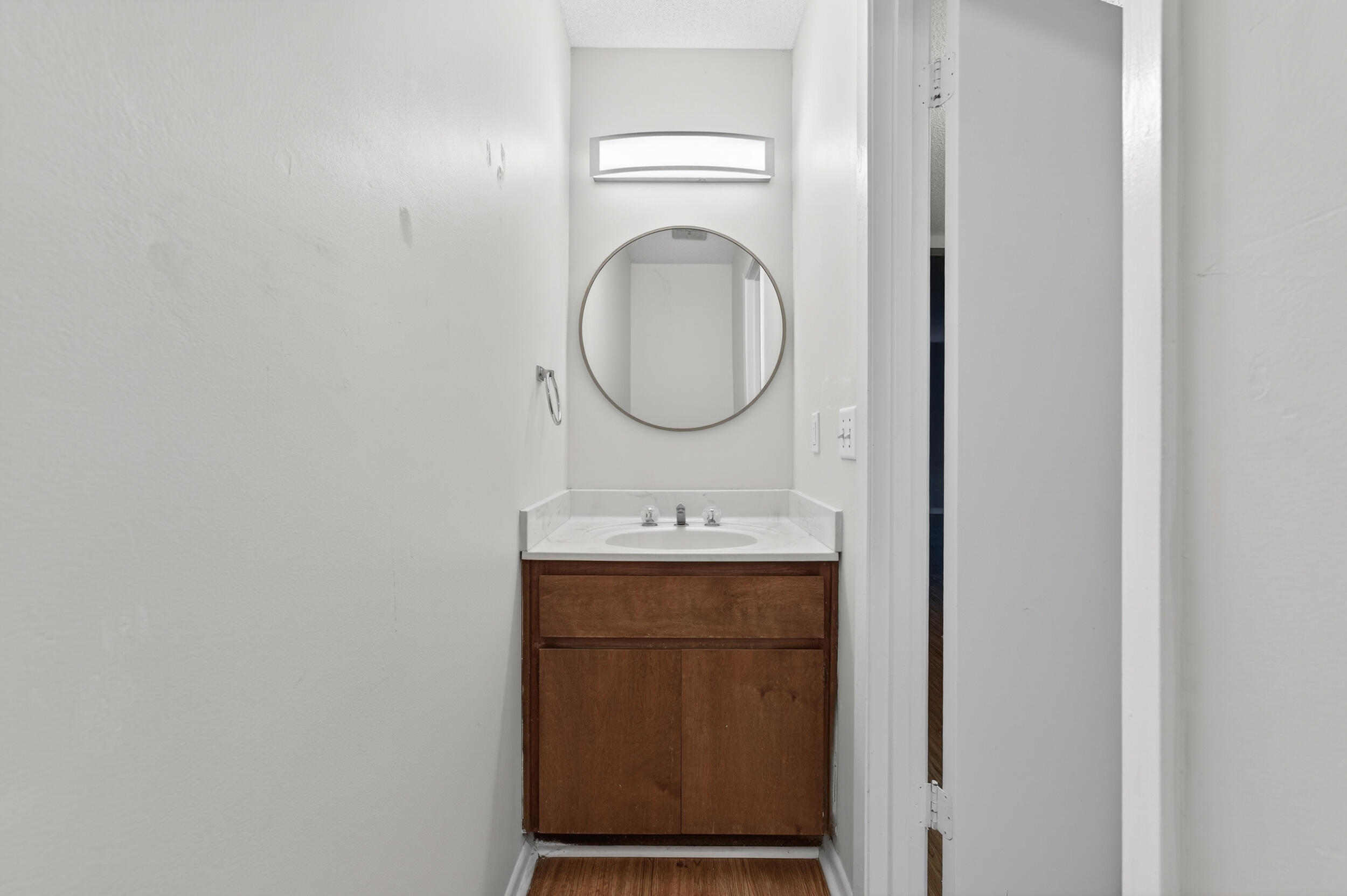 132 5th Avenue Shalimar, FL 32579 - Photo 15 of 39 a bathroom with a sink and a mirror