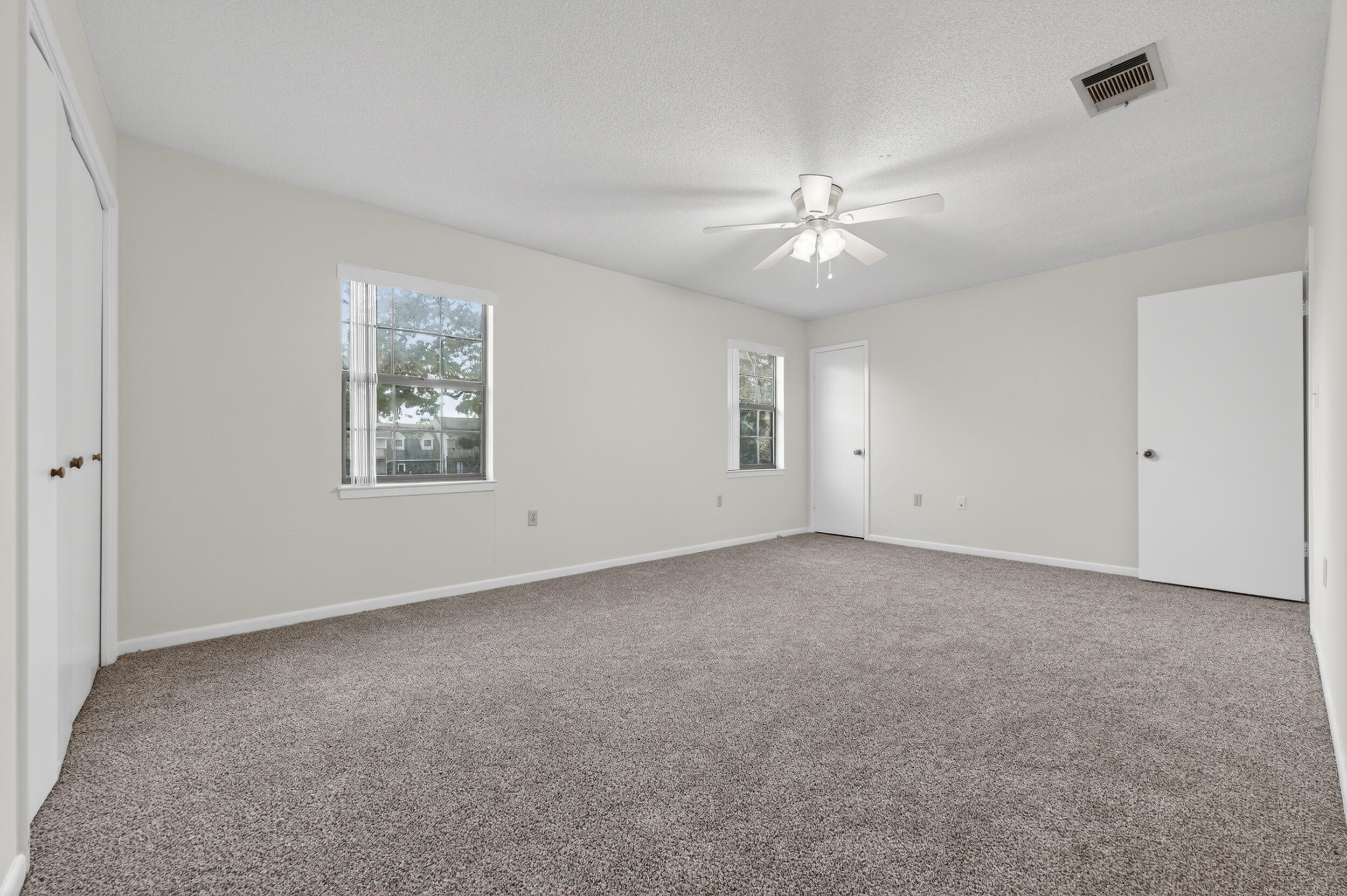 132 5th Avenue Shalimar, FL 32579 - Photo 19 of 39 a view of an empty room with a window
