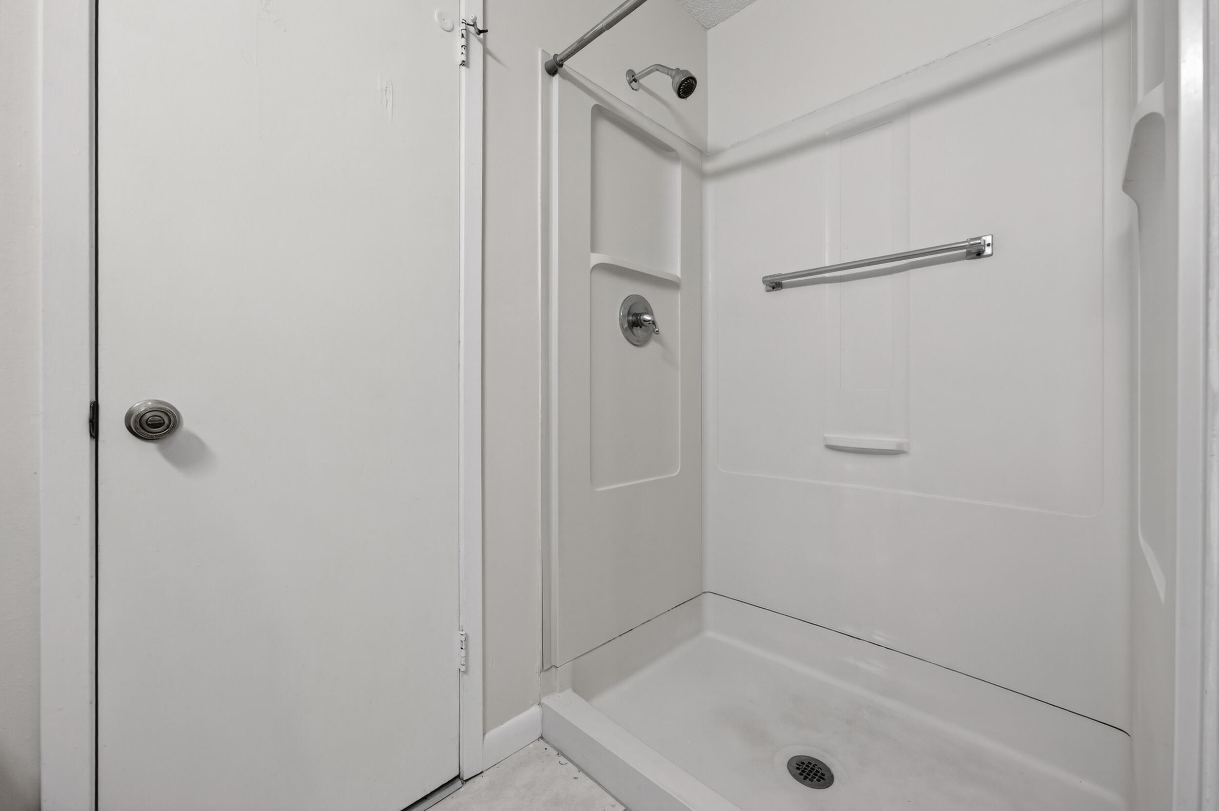132 5th Avenue Shalimar, FL 32579 - Photo 22 of 39 a bathroom with a tub and shower