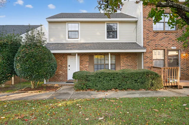 front view of a house with a yard
