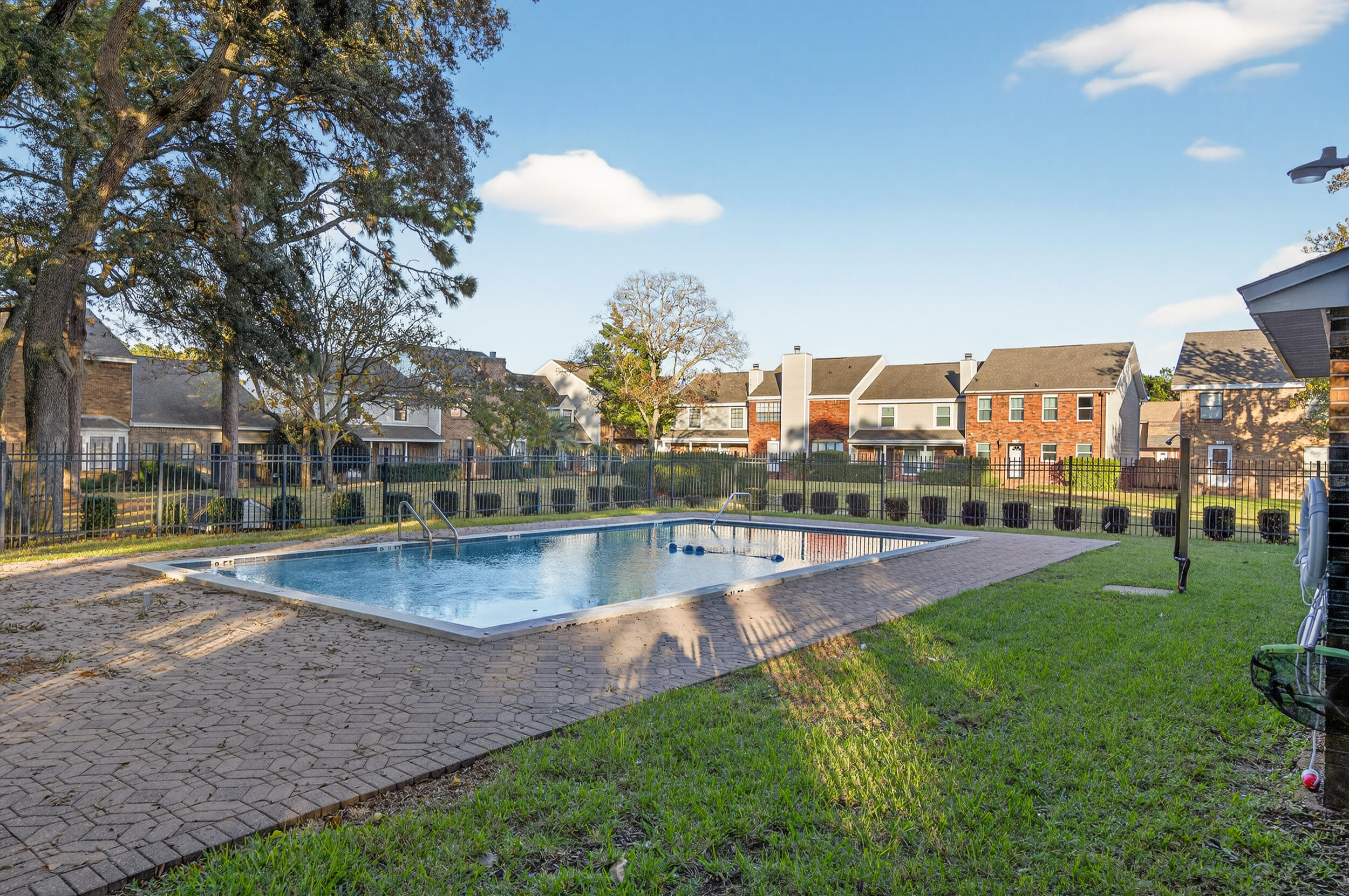 132 5th Avenue Shalimar, FL 32579 - Photo 35 of 39 a view of a swimming pool and a yard