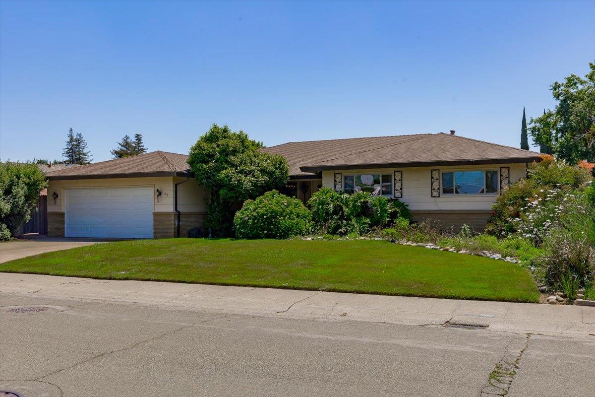 69 Springbrook Circle Sacramento, CA 95831 - Photo 3 of 29 a front view of a house with garden