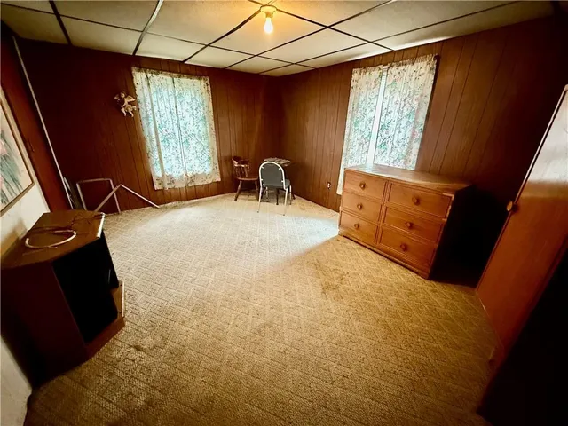 a view of a room with rack and wooden floor
