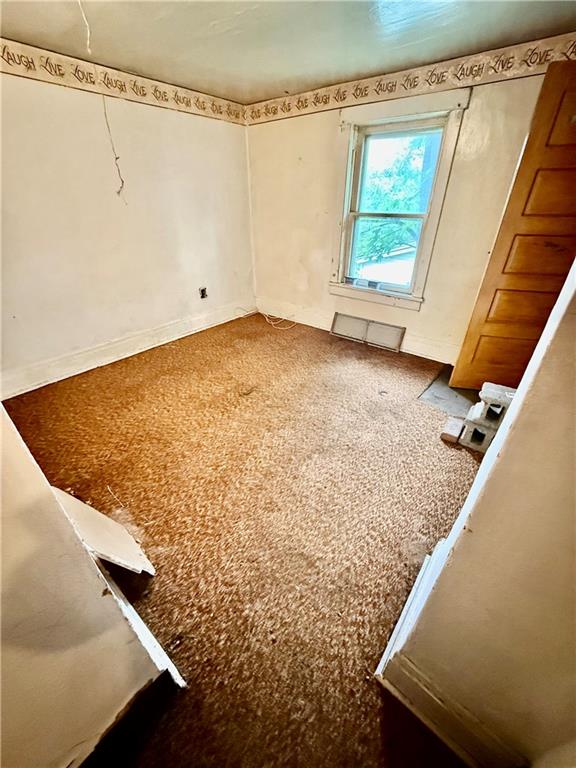 411 East Avenue Allison, PA 15413 - Photo 13 of 19 a view of a room with rack and wooden floor