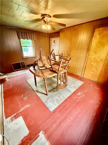 a view of a livingroom with furniture and window