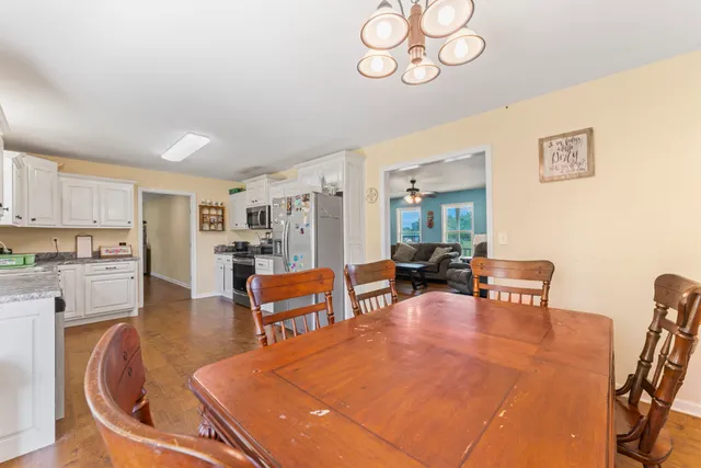 a living room with furniture and a table