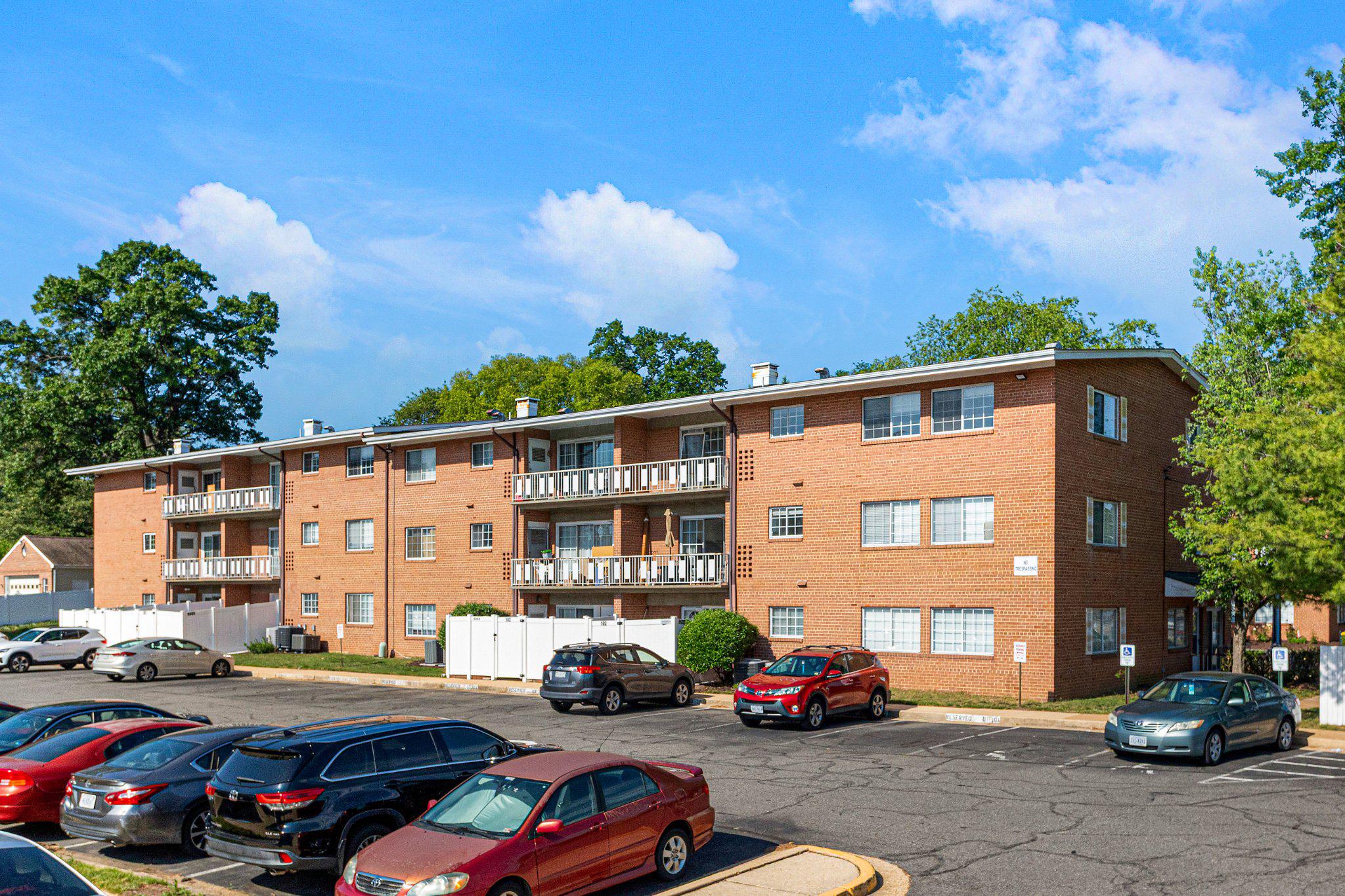 5613 Franconia Road, Unit 303 Alexandria, VA 22310 - Photo 27 of 27 a cars parked in front of a building