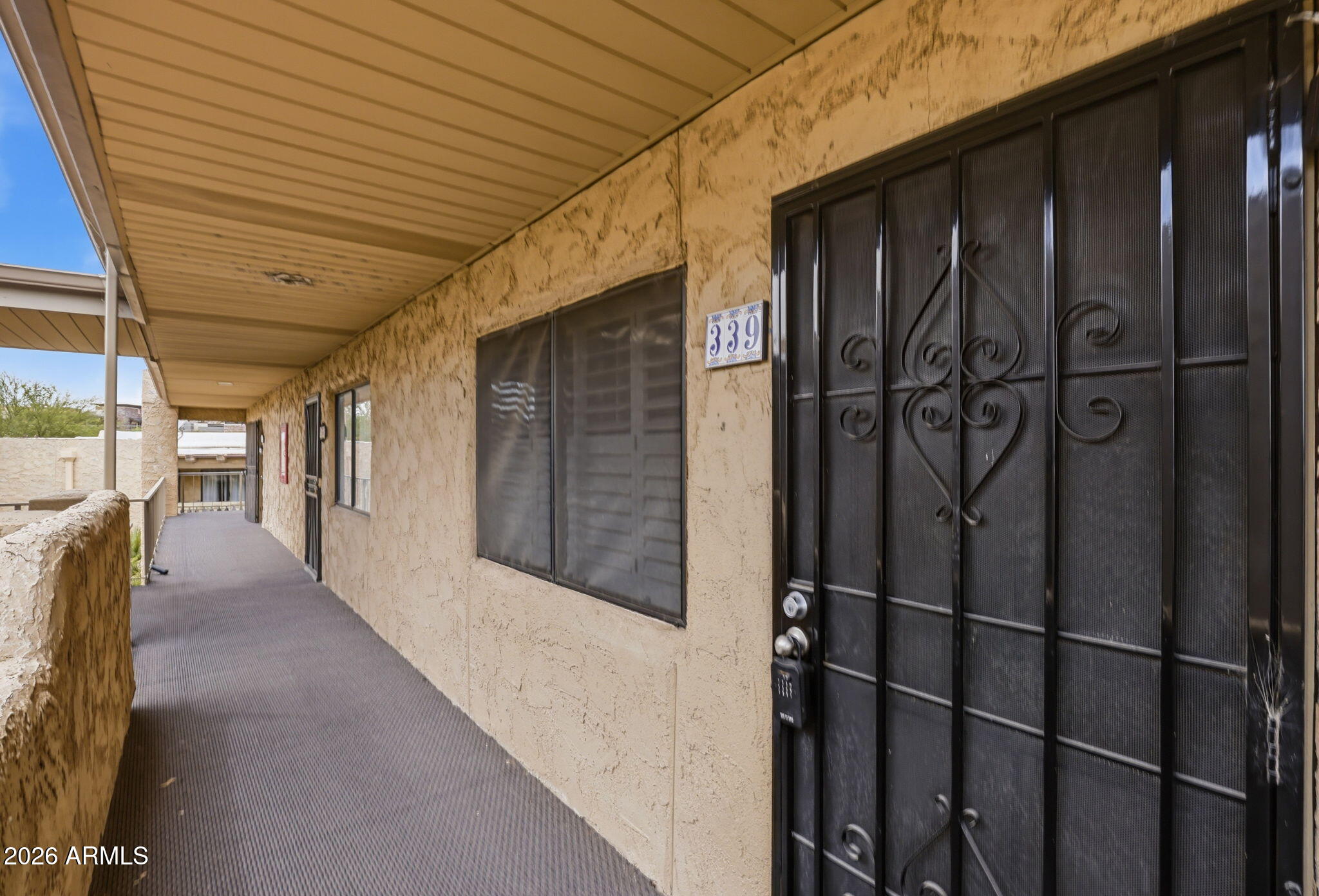 4950 North Miller Road, Unit 339 Scottsdale, AZ 85251 - Photo 9 of 28 a view of a porch