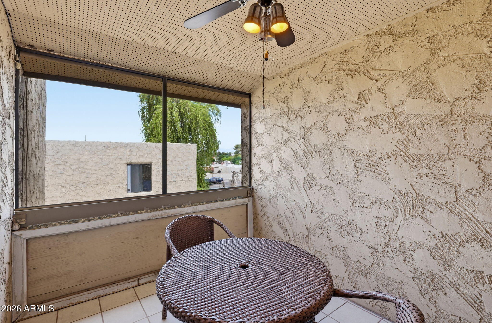 4950 North Miller Road, Unit 339 Scottsdale, AZ 85251 - Photo 25 of 28 a bathroom with a toilet and a large window