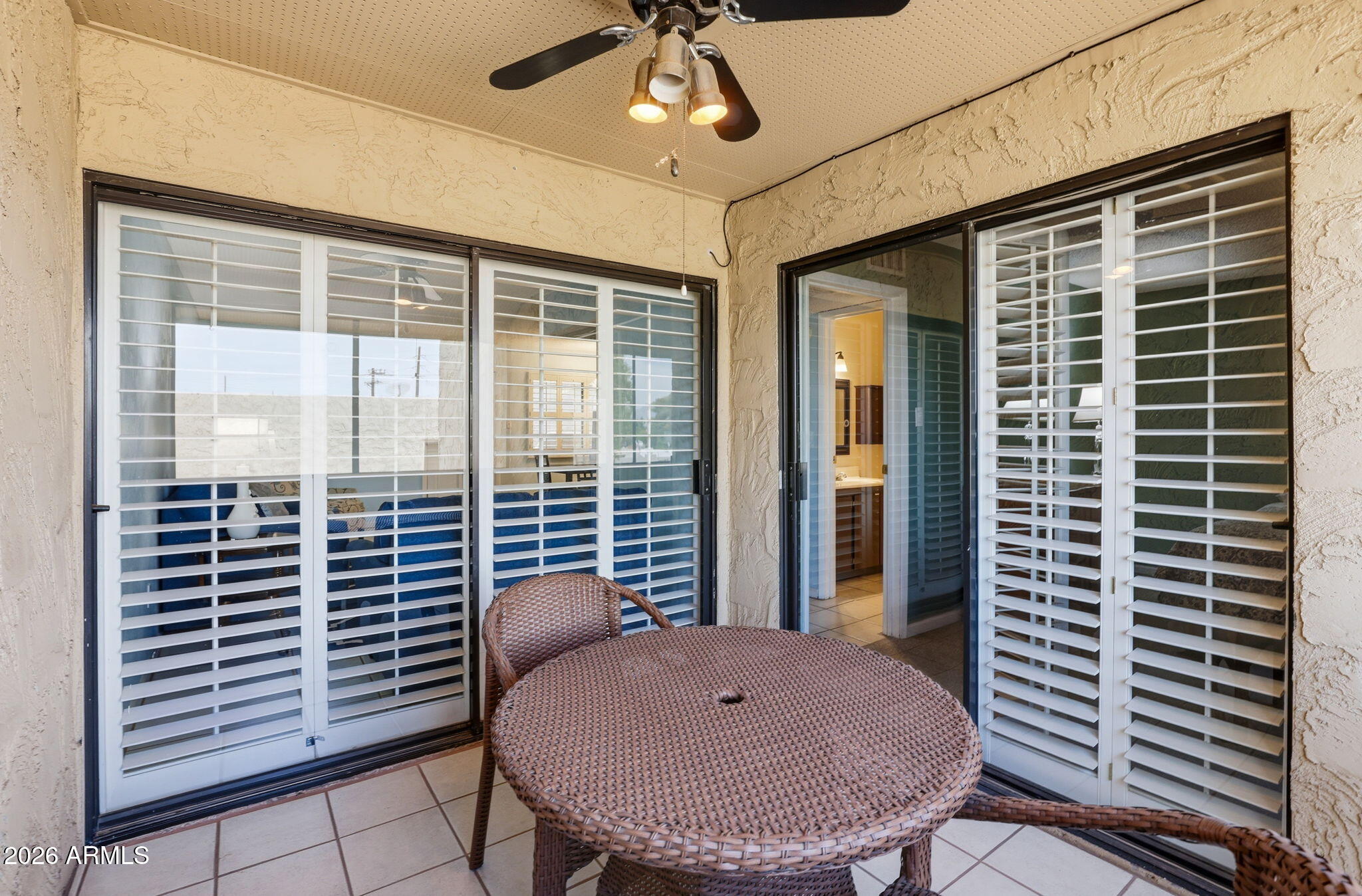 4950 North Miller Road, Unit 339 Scottsdale, AZ 85251 - Photo 26 of 28 a view of a room with a table and chairs