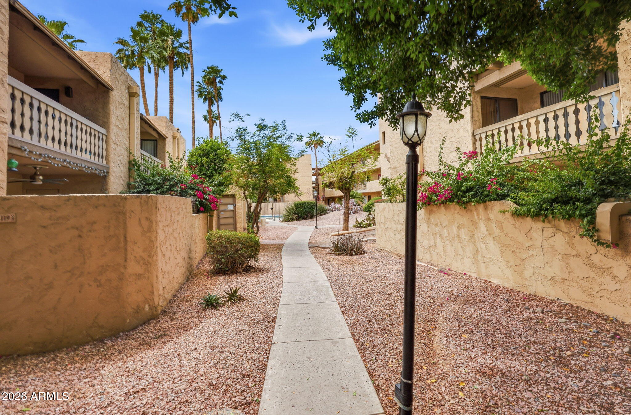 4950 North Miller Road, Unit 339 Scottsdale, AZ 85251 - Photo 2 of 28 a view of a pathway with a pathway