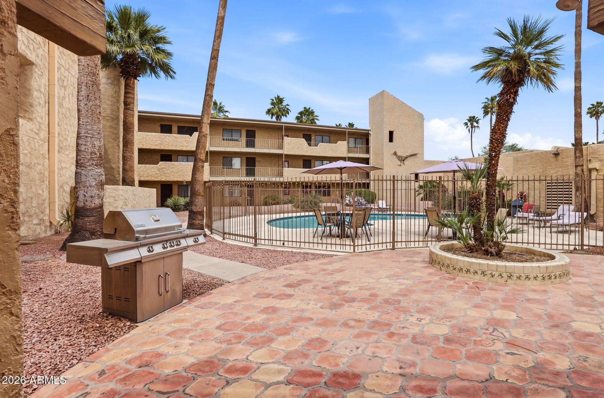 4950 North Miller Road, Unit 339 Scottsdale, AZ 85251 - Photo 8 of 28 a view of a patio with a patio