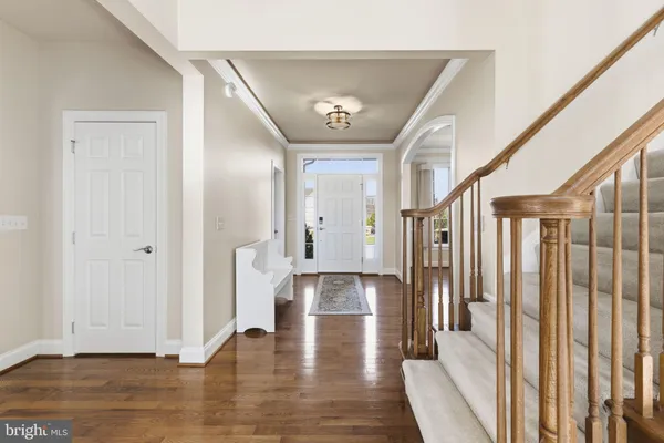 a view of entryway with wooden floor