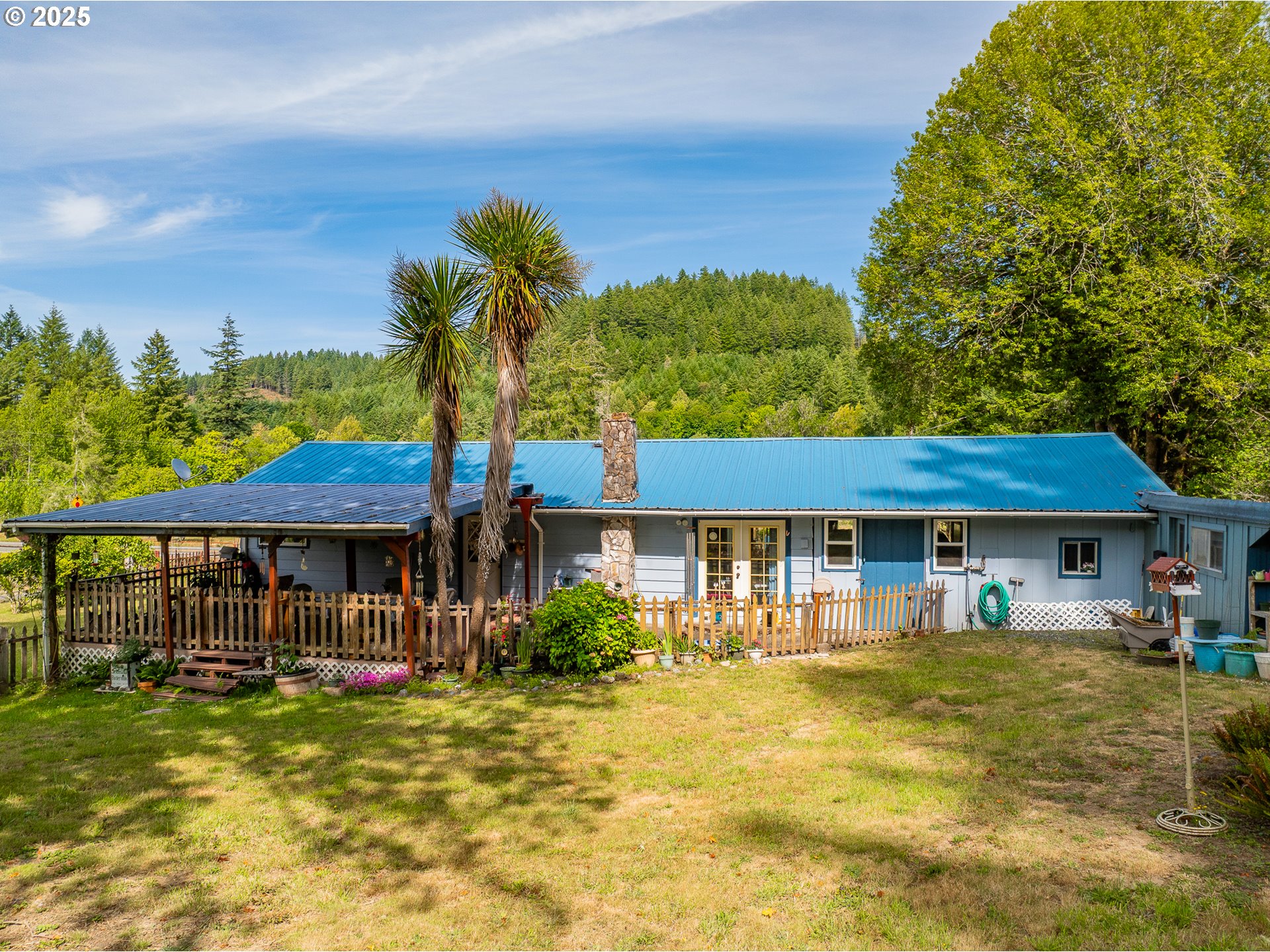 51320 Myrtle Creek Road Myrtle Point, OR 97458 - Photo 11 of 44 a front view of a house with swimming pool