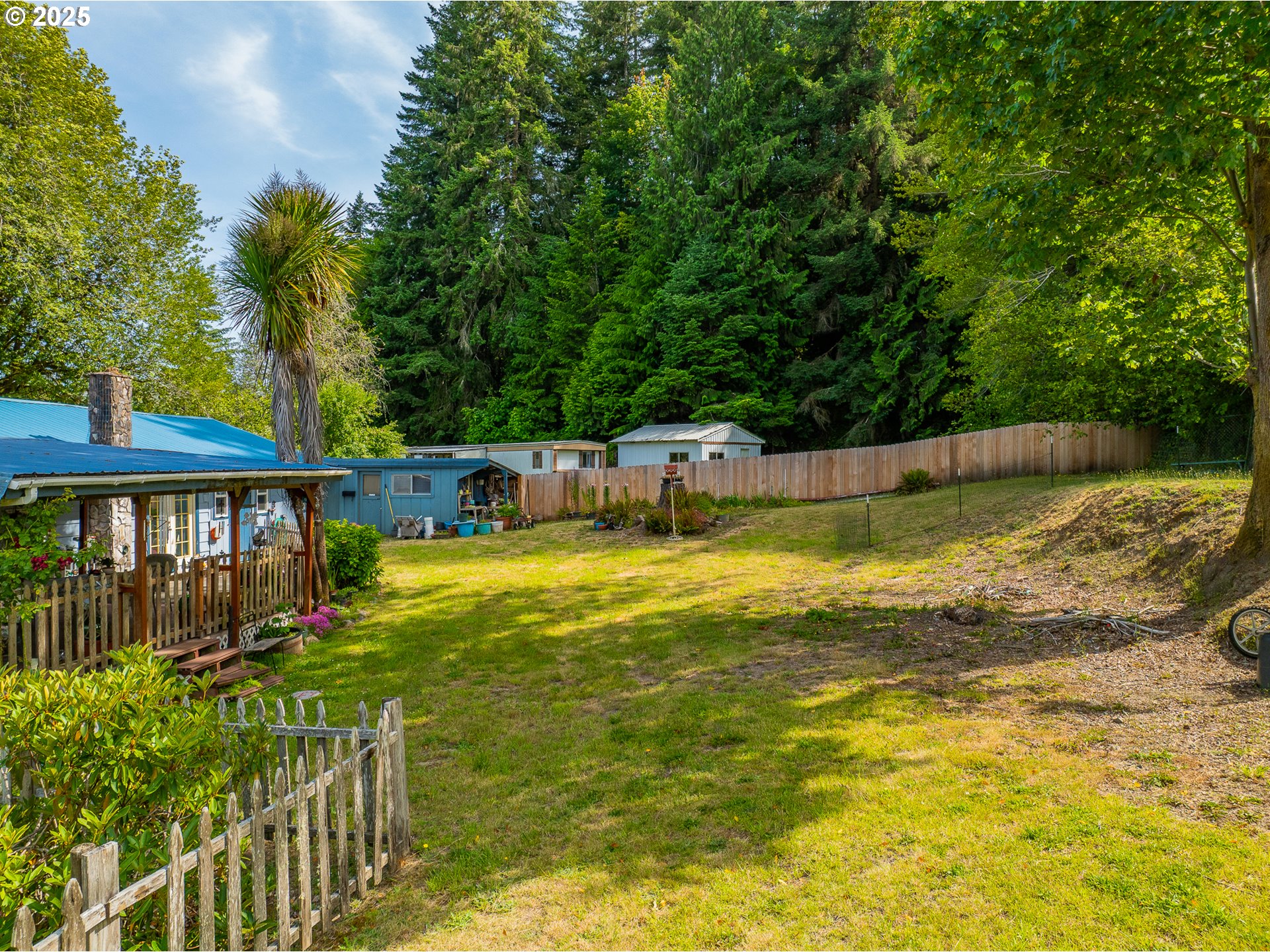 51320 Myrtle Creek Road Myrtle Point, OR 97458 - Photo 14 of 44 a view of a swimming pool with a patio