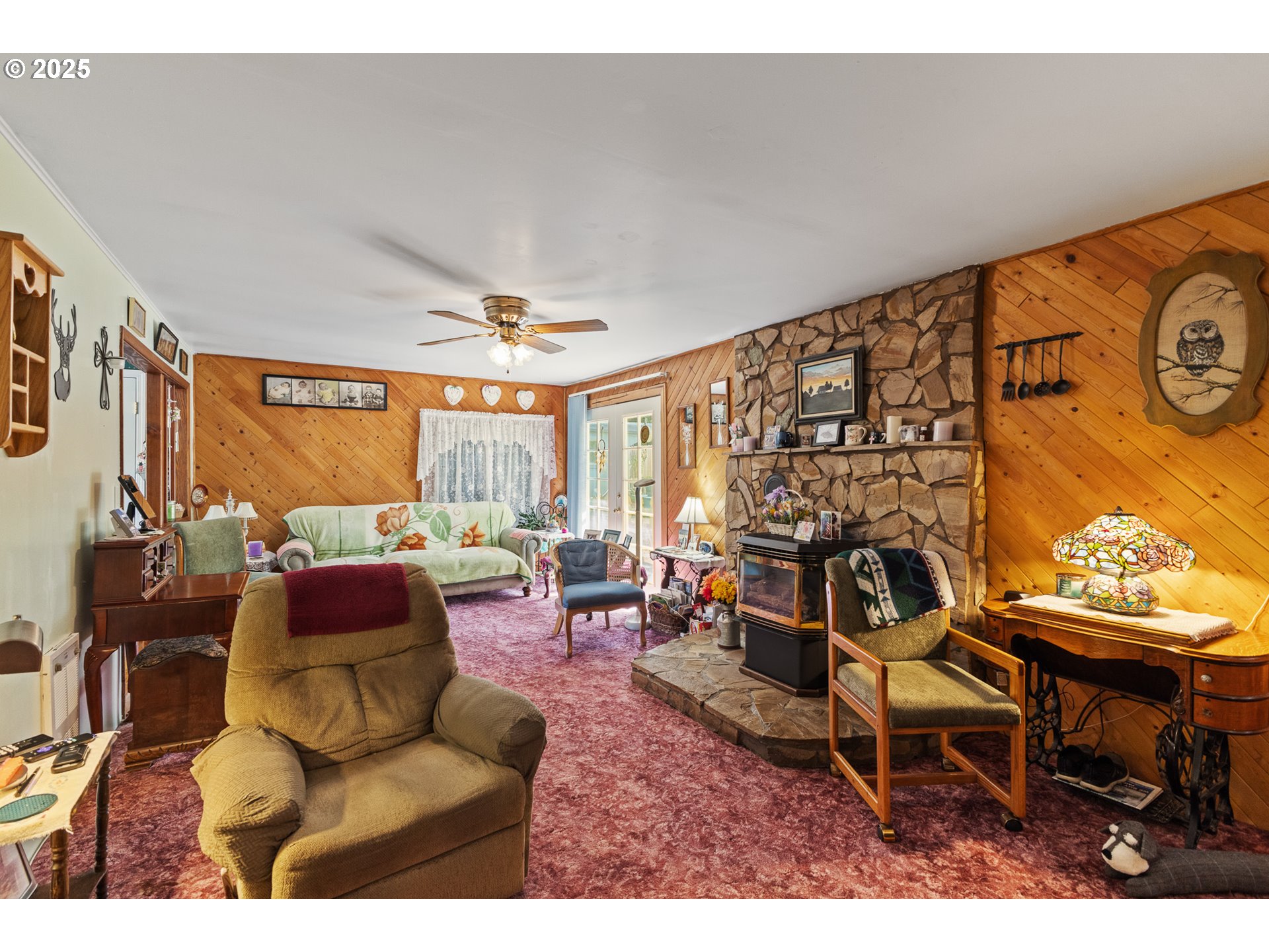 51320 Myrtle Creek Road Myrtle Point, OR 97458 - Photo 22 of 44 a living room with furniture and a large window