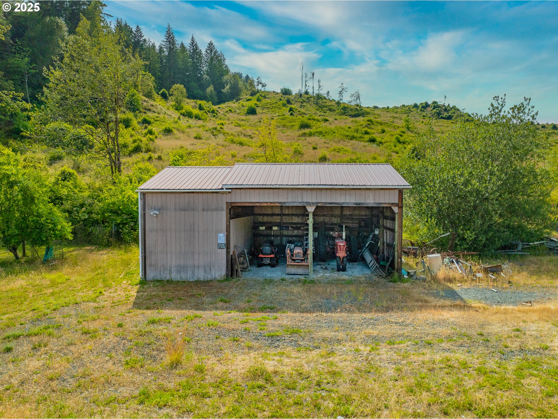 51320 Myrtle Creek Road Myrtle Point, OR 97458 - Photo 9 of 44 a view of a house with a yard