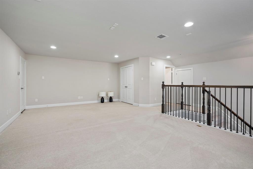 6216 Exeter Avenue McKinney, TX 75070 - Photo 31 of 40 This flex space could be a 4th bedroom/ 2nd primary, game room, media room, or exercise room- the possibilities are endless.