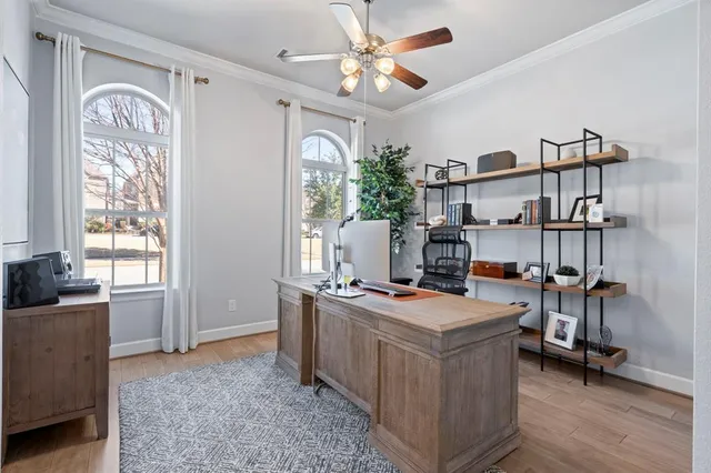 a view of a workspace with furniture