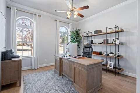 a view of a workspace with furniture