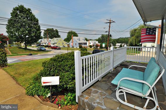 1253 Elm Road Baltimore, MD 21227 - Photo 1 of 29 a view of a chairs and tables in the patio
