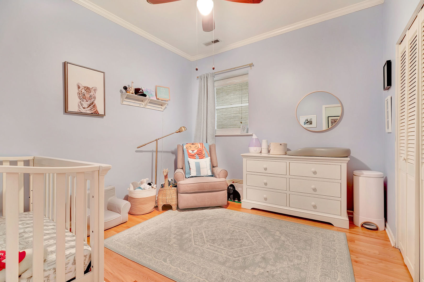 2837 North Burling Street, Unit 1S Chicago, IL 60657 - Photo 12 of 17 a bedroom with a bed and a dresser