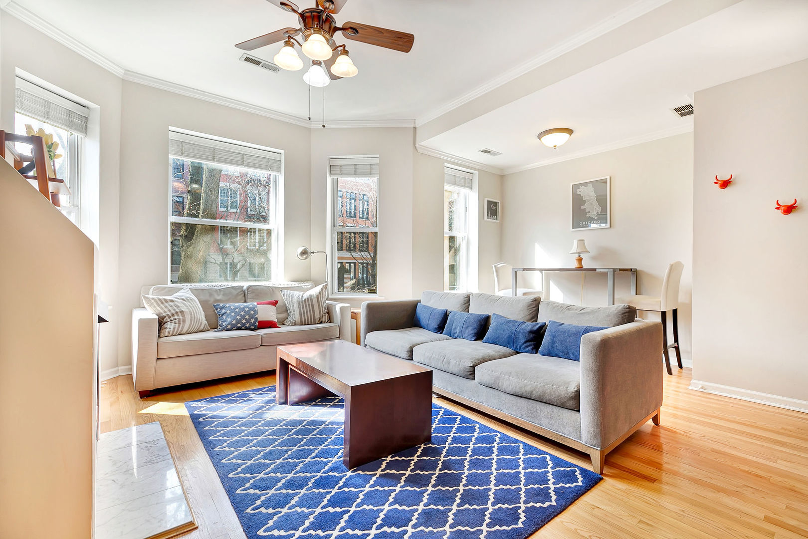 2837 North Burling Street, Unit 1S Chicago, IL 60657 - Photo 2 of 17 a living room with furniture and a large window