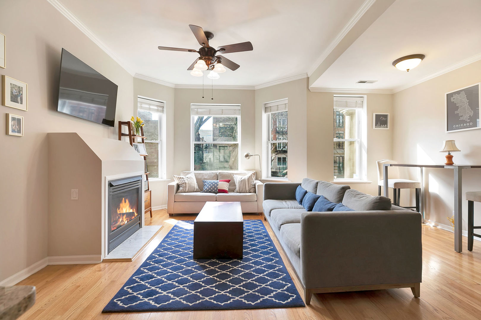 2837 North Burling Street, Unit 1S Chicago, IL 60657 - Photo 3 of 17 a living room with furniture and a fireplace