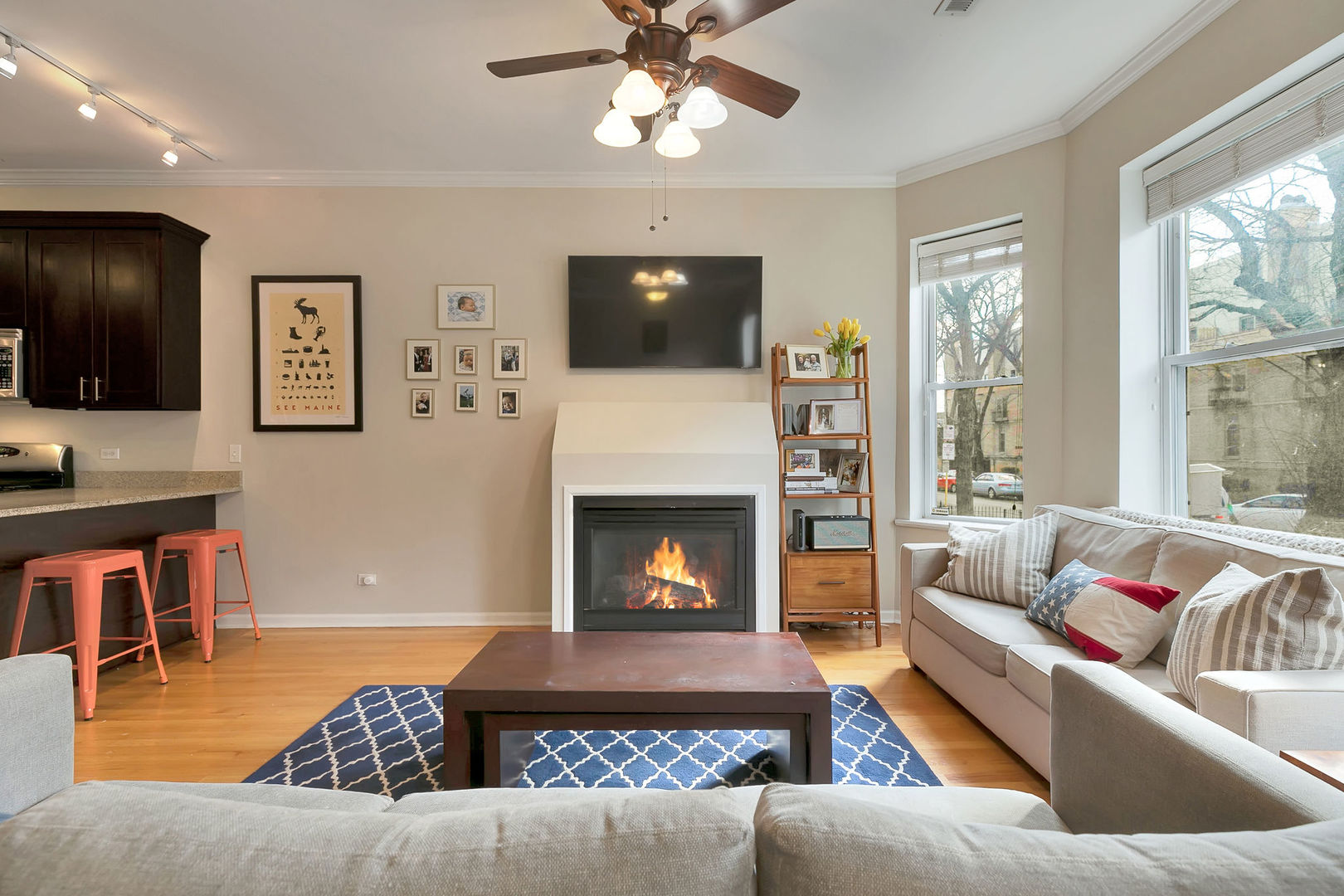 2837 North Burling Street, Unit 1S Chicago, IL 60657 - Photo 4 of 17 a living room with furniture and a fireplace