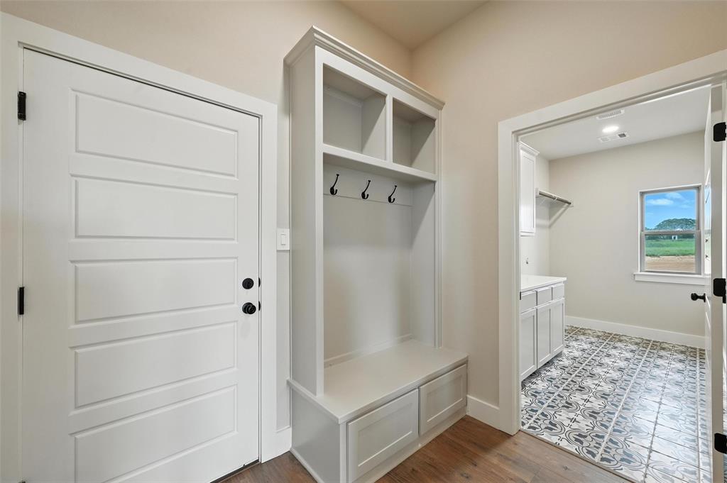 224 Kilkenny Road Poolville, TX 76487 - Photo 28 of 32 a bathroom with a bathtub