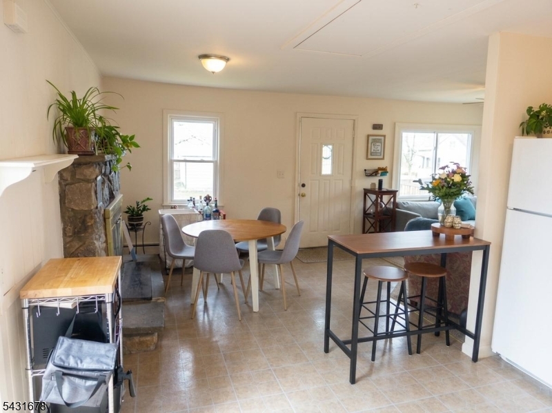 48 Vail Road Landing, NJ 07850 - Photo 13 of 23 a view of a dining room with furniture window and wooden floor