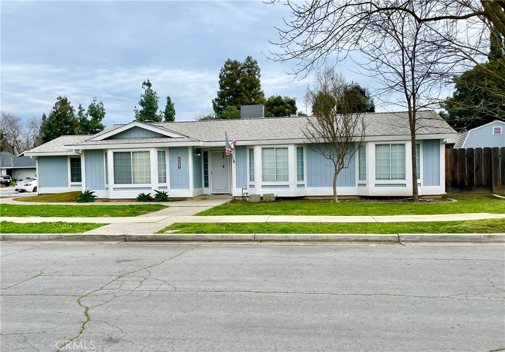3332 Shamrock Avenue Merced, CA 95340 - Photo 1 of 35 a view of swimming pool and tree in front of house