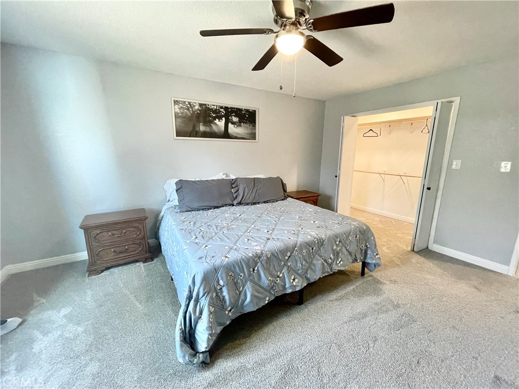 3332 Shamrock Avenue Merced, CA 95340 - Photo 25 of 35 a bedroom with a bed and cabinets