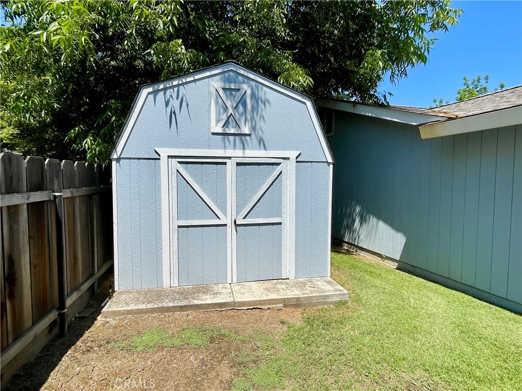 3332 Shamrock Avenue Merced, CA 95340 - Photo 34 of 35 a front view of a house with a yard