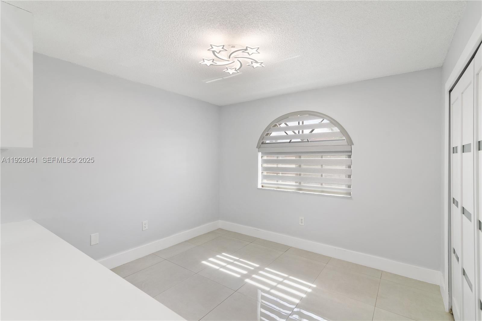 3375 West 76th Street, Unit 210 Hialeah, FL 33018 - Photo 18 of 31 a view of livingroom with window