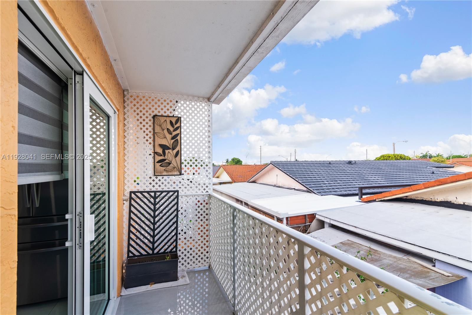 3375 West 76th Street, Unit 210 Hialeah, FL 33018 - Photo 2 of 31 a view of balcony and deck