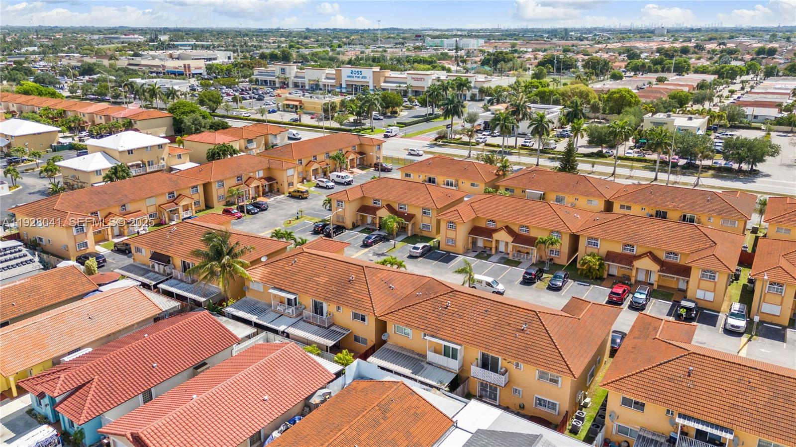 3375 West 76th Street, Unit 210 Hialeah, FL 33018 - Photo 30 of 31 an aerial view of residential houses with outdoor space