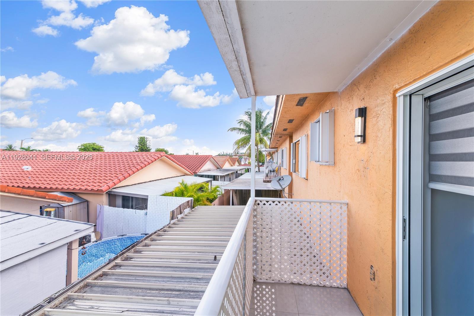 3375 West 76th Street, Unit 210 Hialeah, FL 33018 - Photo 3 of 31 a view of a house with entertaining space