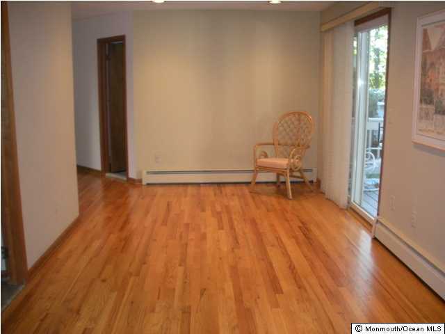 1508 Dorsett Dock Road Point Pleasant, NJ 08742 - Photo 3 of 3 a view of a room with wooden floor and bench