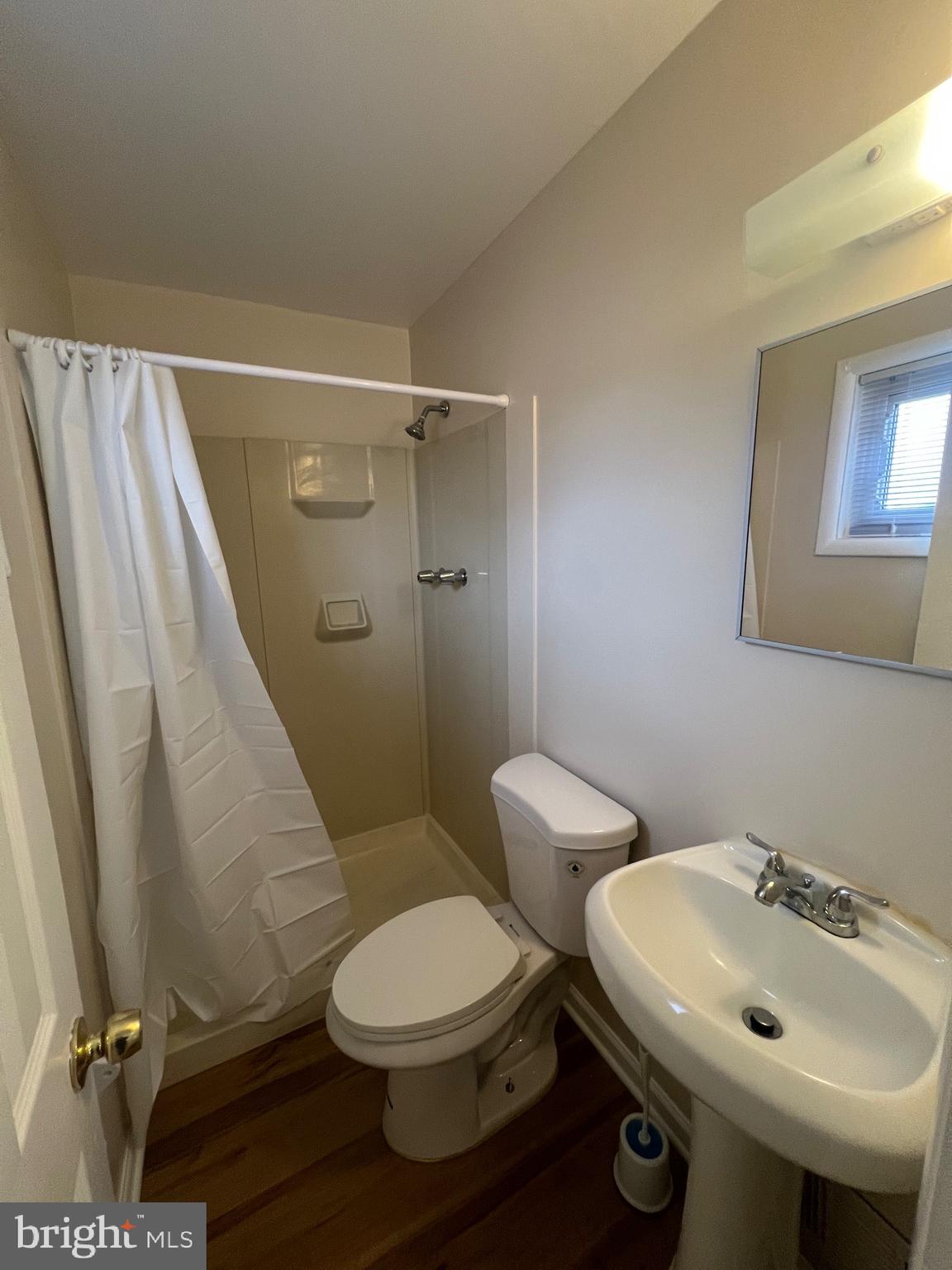 800 Jefferson Street Northeast Washington, DC 20011 - Photo 4 of 17 a bathroom with a sink a toilet and shower