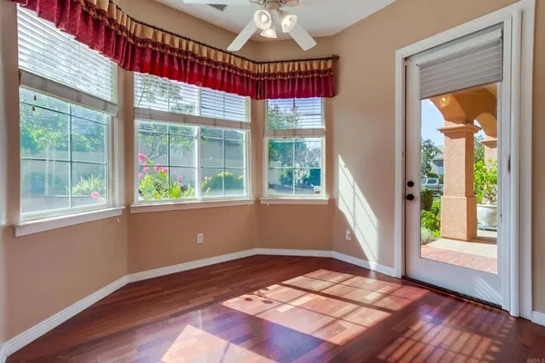 a view of empty room with a fireplace